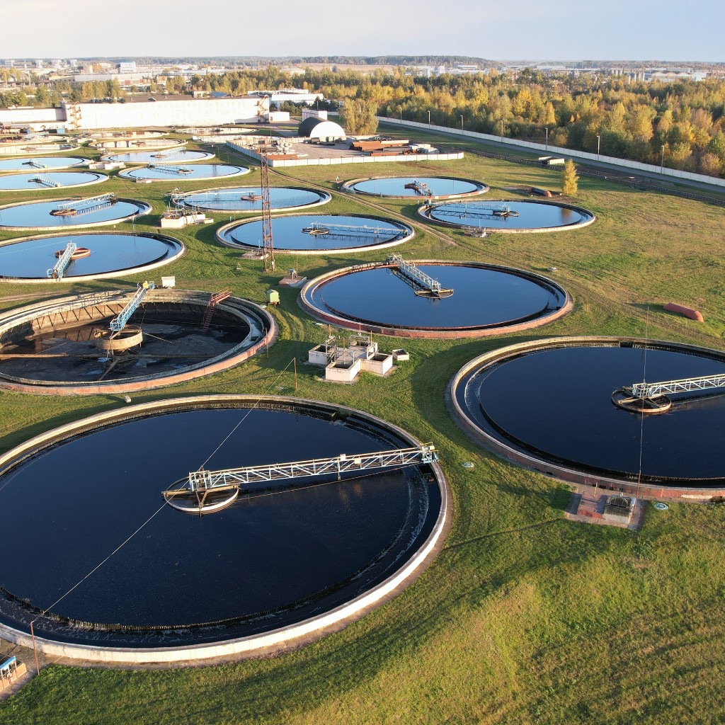 Aerial view of clarifier tanks at a wastewater treatment plant